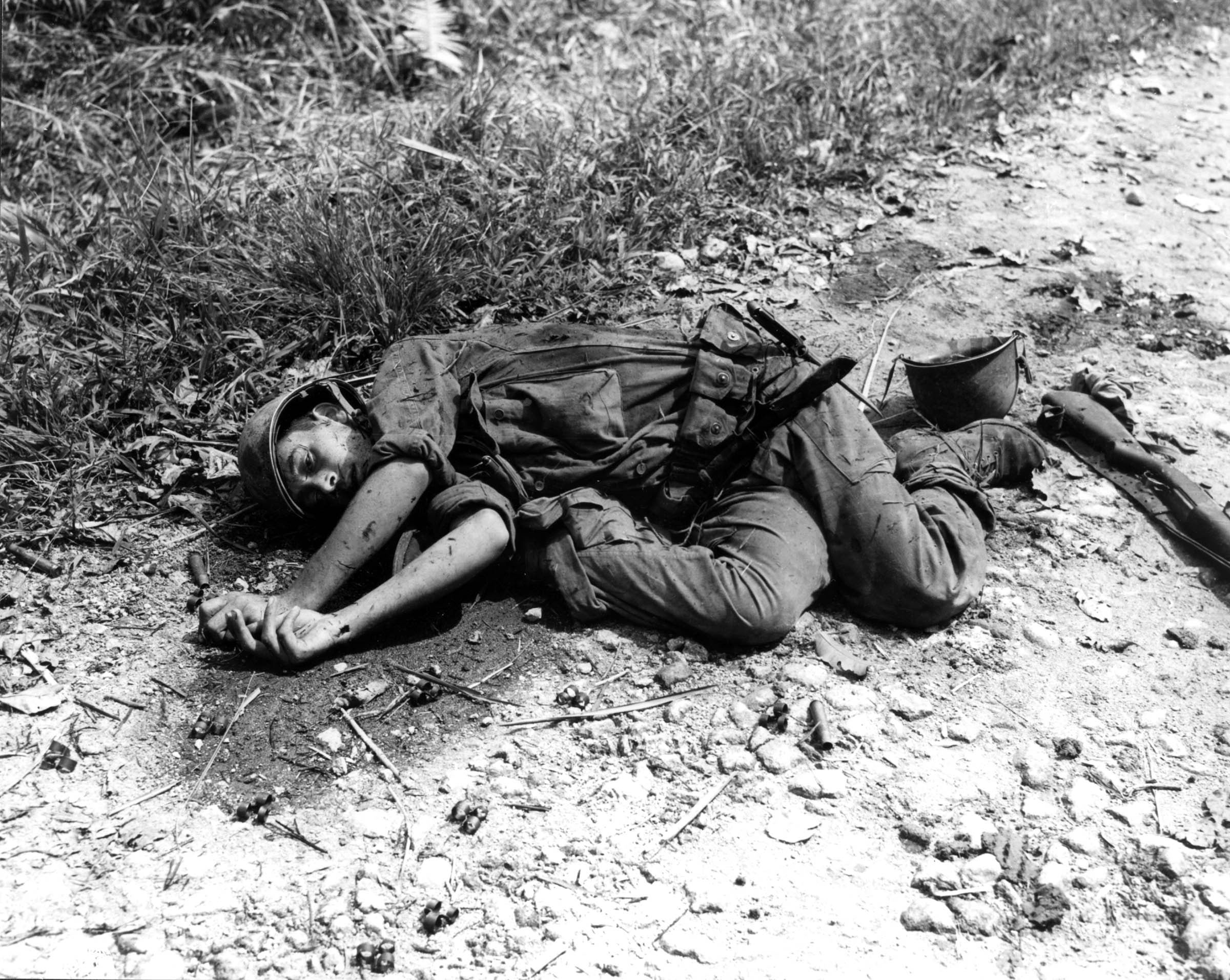 Until September 1943, government censors blocked the publication of all photographs showing dead American soldiers. After that, censors continued to withhold many pictures—such as this photograph taken on Leyte Island in the Philippines on October 31, 1944—that did not, even in death, conform to the heroic image of the American fighting man.