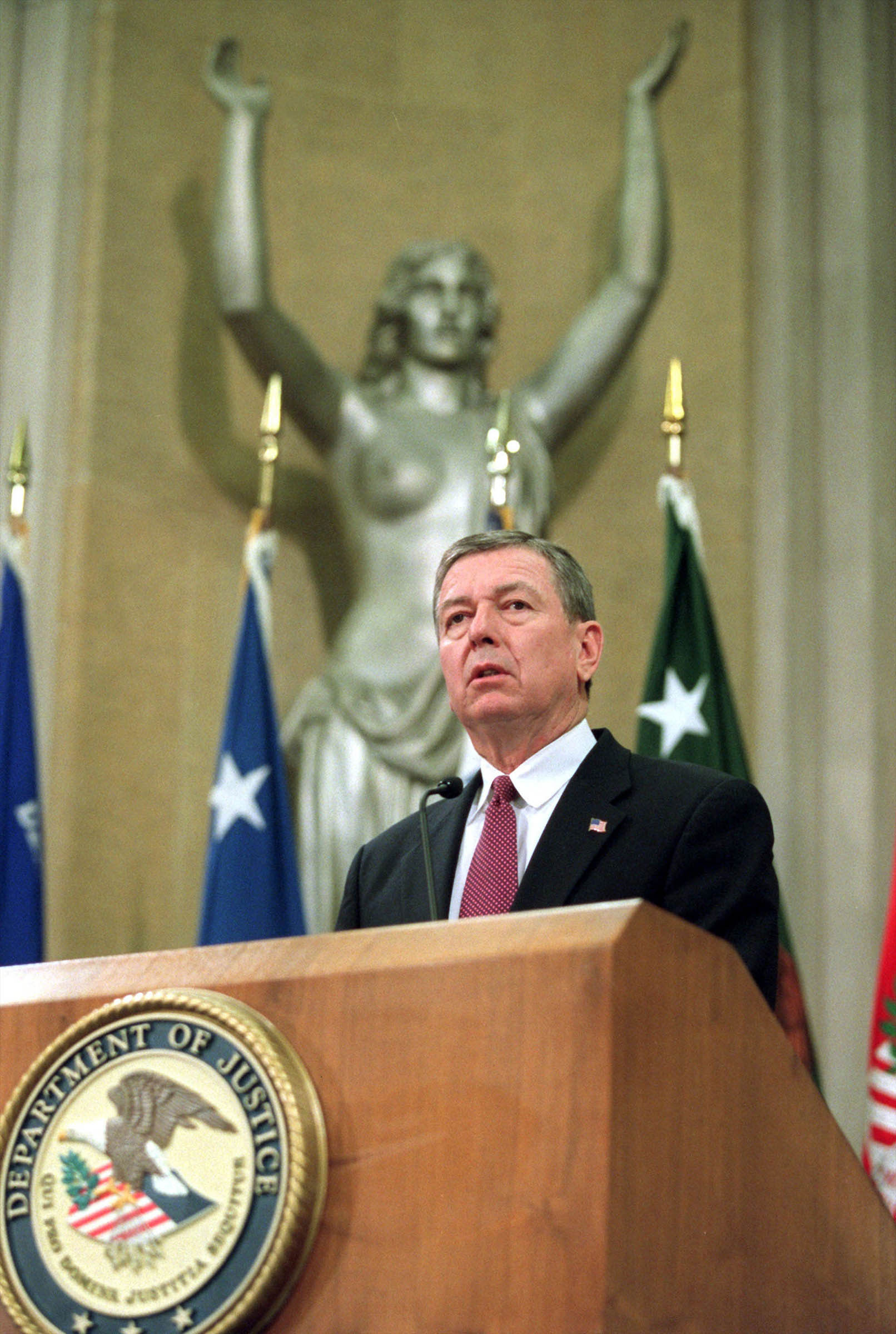 Conservative Attorney General John Ashcroft, unhappy with press photographs showing him in front of the seminude <em>Spirit of Justice</em>, one of two statues adorning the podium in the Department of Justice’s Great Hall, allocated &dollar;8,000 for the purchase of curtains to hang over the offending aluminum Art Deco sculpture.
