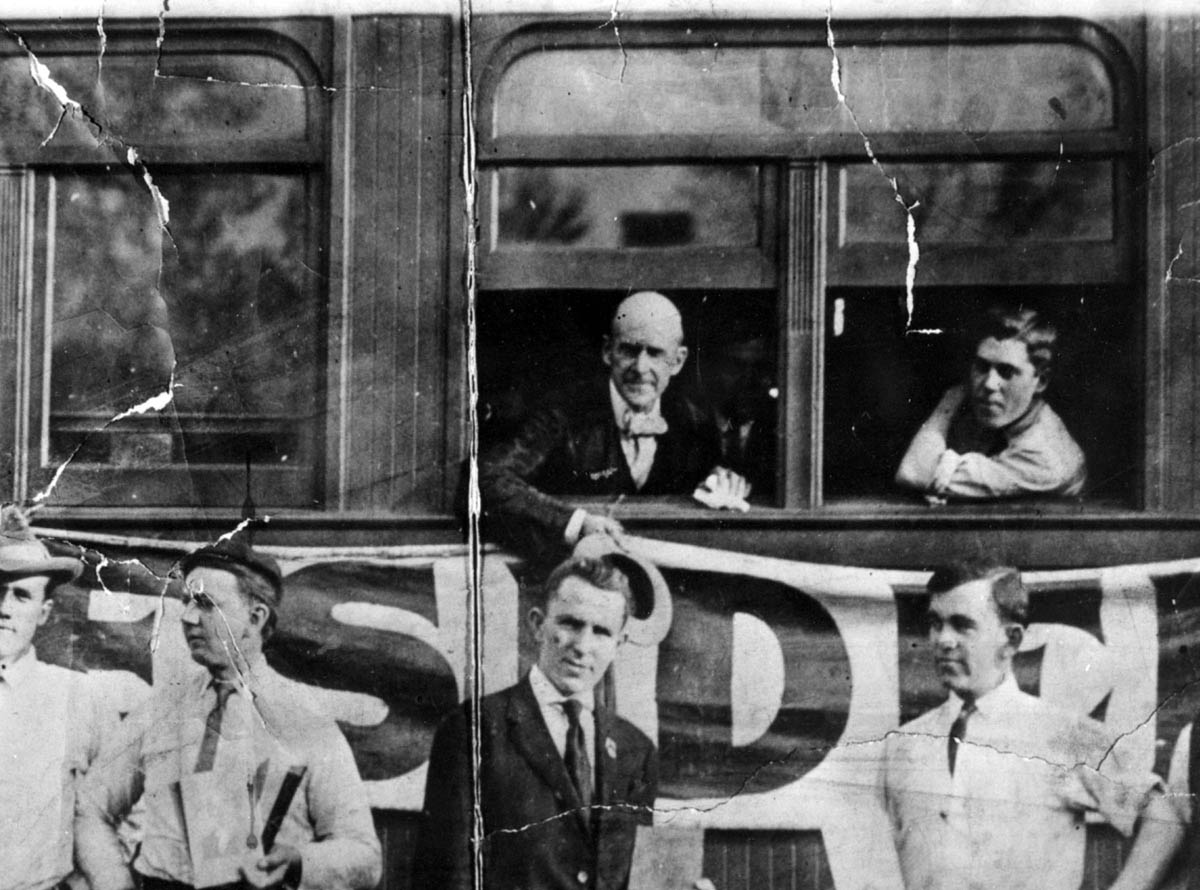 Eugene Debs, Socialist Party staffers, and the “Red Special” train on which the presidential candidate traveled during his 1908 whistle-stop campaign.