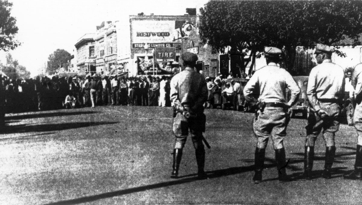 On September 16, 1936, at the height of the Salinas Valley, California, lettuce strike, members of the Fruit and Vegetable Workers’ Union blocked a downtown Salinas street. Their intent was to stop a convoy of trucks carrying produce harvested by strikebreakers. California State Police attacked the strikers shortly after this photo was taken.